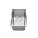 Silver 9" x 5" Chicago Metallic 1-pound loaf pan with a textured interior and smooth edges, shown on a white background.