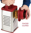 Rachael Ray stainless steel box grater in red with a contoured handle and a finger guard, shown on a white background.