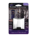 Adhesive super decorator hook in white shown on a white background.
