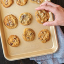 Cookies on a baking sheet, on a wooden table
