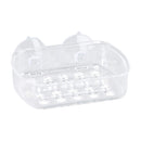 Clear plastic soap dish with raised ridges and suction cups for wall mounting.