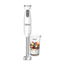 A Cuisinart Smart Stick Hand Blender in white with a metallic silver blending shaft is positioned vertically. Below it, a clear Cuisinart blending cup is filled with white yogurt topped with chopped peaches and blueberries. The blender features "Cuisinart Smart Stick" branding, an "ON" button, and a lock symbol at the top, all set against a clean white background.