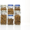 A clear, empty Bormioli Rocco Fido square glass jar with a dark blue hinged lid and wire bail closure, featuring an airtight rubber gasket.