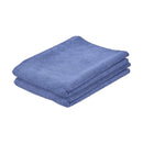 A neatly folded stack of three light blue, textured microfiber cloths.