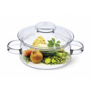 Clear 2-liter round glass casserole dish with lid and cork coaster by Simax Glassware, displayed on a white background.