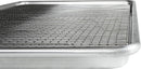 Closeup of a stainless steel 12" x 17" cooling and baking rack with a cross-wire grid and six supporting feet shown on a white background.