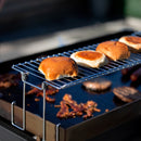 Yukon Glory Griddle Warming Rack, perfect for keeping food warm while cooking.
