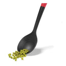 A black Starfrit multi-tool spoon with a red and black ergonomic handle featuring a hanging hole. The spoon has a deep, rounded head with ridges, suggesting multiple functionalities.