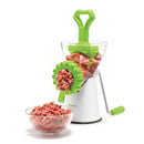 Starfrit brand manual meat grinder featuring a white base, clear hopper, green pusher and turning handle, and a grinding plate.