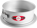  A 10-inch round anodized aluminum springform pan with a pedestal base and stainless steel latch shown on a white background.