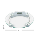 Clear round glass bathroom scale with chrome frame and digital LCD screen, displayed on a white background.