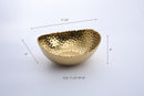 Elegant Pampa Bay Golden Millennium large oval bowl with a richly textured, hammered gold surface and an irregular rim.
