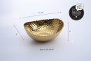 Elegant Pampa Bay Golden Millennium large oval bowl with a richly textured, hammered gold surface and an irregular rim.