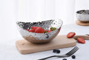 A Pampa Bay Millennium oval bowl with a white porcelain finish.