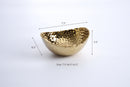 Hammered gold decorative bowl with textured finish, measuring 7.5 x 6.5 x 3.5 inches.