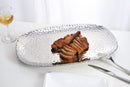 Pampa Bay Millennium large serving platter, showcasing its unique textured silver finish and sophisticated design for serving food.