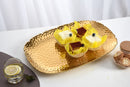 Pampa Bay Golden Millennium large serving platter, showcasing its unique textured gold finish and sophisticated design for serving food.