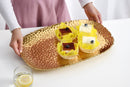 Pampa Bay Golden Millennium large serving platter, showcasing its unique textured gold finish and sophisticated design for serving food.
