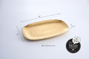 Pampa Bay Golden Millennium large serving platter, showcasing its unique textured gold finish and sophisticated design for serving food.