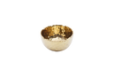 A slightly angled view of a Pampa Bay Golden Millennium Porcelain Snack Bowl. The bowl has a rich, hammered gold interior with a reflective, textured surface, and a smooth, matte off-white or cream exterior. The rim of the bowl is irregularly shaped, following the hammered texture of the interior. It is presented against a plain white background.