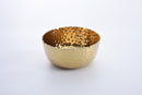 Elegant Pampa Bay Golden Millennium large porcelain round bowl with a richly textured, hammered gold surface inside and out, and an irregular rim.