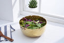 Elegant Pampa Bay Golden Millennium large porcelain round bowl with a richly textured, hammered gold surface inside and out, and an irregular rim.