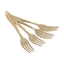 Set of four gold dessert forks with hammered handles, displayed on a white background.