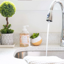 Clear bottle of Greenleaf Cashmere Kiss foaming hand soap with a white pump, featuring a warm floral fragrance and a decorative label.
