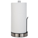 A Kitchen Details paper towel holder stands upright, featuring a round stainless steel base with a black trim. A roll of white paper towels is held in place by a silver-toned top and a curved metal tension arm extending from the base.