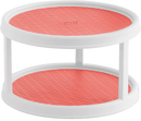 Two-tier rotating turntable organizer with a white frame and coral non-slip surface, ideal for kitchen or pantry storage.