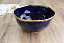 Elegant Pampa Bay Sunset by the Sea large porcelain serving bowl in a deep blue with a wavy gold rim, measuring 8.5 inches in diameter and 5 inches tall.