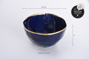 Elegant Pampa Bay Sunset by the Sea large porcelain serving bowl in a deep blue with a wavy gold rim, measuring 8.5 inches in diameter and 5 inches tall.