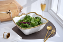Large square salad bowl in white porcelain with a textured surface and a beaded golden rim.