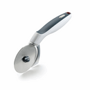A Zyliss Sharp Edge Pizza Cutter in its original packaging. The cutter features a stainless steel blade with a gray safety guard and a white ergonomic handle. The packaging is white and gray with the Zyliss logo and product name clearly visible. An inset image shows the cutter in use.