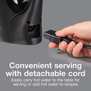 The 1 Liter Electric Kettle from Proctor Silex, available in black, includes auto shutoff and boil-dry protection. It features a transparent water level indicator and an ergonomic handle, with the brand name displayed near the top. The spout also comes with a steam release cover.