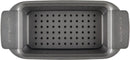Top view of a gray nonstick loaf pan with a removable draining insert, designed for baking meatloaf, shown on a white background.