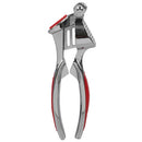 Home Basics Zinc Garlic Press with ergonomic red handles, designed for easy crushing of garlic cloves.