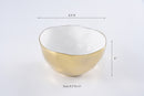 Stylish large serving bowl from Pampa Bay's Moonlight collection, featuring a gold tarnish-free outer surface, a white inner surface, and an organic gold rim.