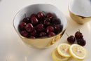 Pampa Bay Moonlight serving bowl, featuring a white porcelain body and a luxurious gold titanium edge that resists tarnishing.