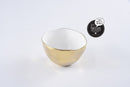 Pampa Bay Moonlight serving bowl, featuring a white porcelain body and a luxurious gold titanium edge that resists tarnishing.