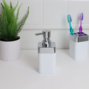 Bathroom or kitchen soap dispenser with a 10 oz capacity, in a stylish white and chrome finish, by Home Basics Skylar.