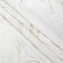 white jacquard napkins with an elegant gold wave pattern