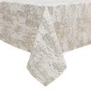 Folded 70" x 108" jacquard tablecloth with gold mosaic print displayed on a white background.
