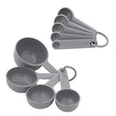 Gray KitchenAid measuring cup and spoon set