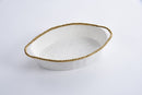 Pampa Bay oval baking dish in white, accented with a bright gold beaded border for a touch of elegance.