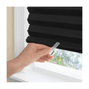 Black pleated window shade with a cordless, easy-to-install design, featuring a clear plastic clip for adjusting the length. The durable, light-blocking material provides privacy and room darkening, making it ideal for bedrooms, offices, and living spaces.