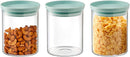 Set of three medium-sized clear glass Godinger food storage canisters with airtight lids, arranged on a white background.